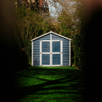 where to place a shed in your backyard